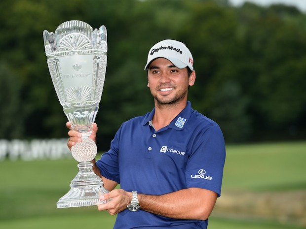 EDISON, NJ - AUGUST 30:  Jason Day of Australia poses with the winner's trophy on the 18th green after his six-stroke victory at The Barclays at Plainfield Country Club on August 30, 2015 in Edison, New Jersey.  (Photo by Ross Kinnaird/Getty Images)