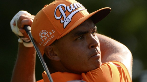 epa04919154 Rickie Fowler of the US watches his shot on the ninth tee during the final round of the Deutsche Bank tournament at the Tournament Players Club Boston in Norton, Massachusetts, USA, 07 September 2015.  EPA/CJ GUNTHER