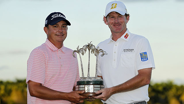 Dec 12, 2015; Naples, FL, USA; Brandt Snedeker (right) and Jason Dufner hold the champions trophy after posting a 30 under par score following the final round of the Franklin Templeton Shootout at Tiburon Golf Club - Gold Course. Mandatory Credit: Reinhold Matay-USA TODAY Sports