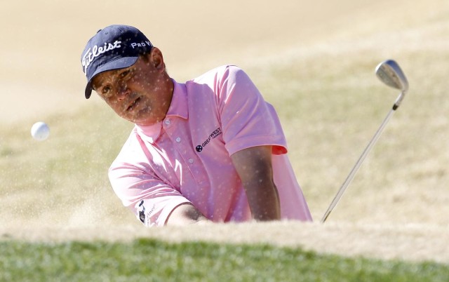 Jason Dufner hits out of the bunker at the second green during the final round of the CareerBuilder Challenge golf tournament on the TPC Stadium course at PGA West in La Quinta, Calif., Sunday, Jan. 24, 2016. (AP Photo/Alex Gallardo)