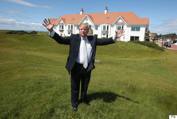 Donald Trump poses for a picture after unveiling the multi-million pound refurbishment of the Trump Turnberry clubhouse at his golf course in south Ayrshire. PRESS ASSOCIATION Photo. Picture date: Monday June 8, 2015. The US billionaire claimed former first minister Alex Salmond did Scotland's landscape a "tremendous disservice" as he spoke out against wind farms at the opening of the new club house. See PA story ENVIRONMENT Trump. Photo credit should read: Andrew Milligan/PA Wire