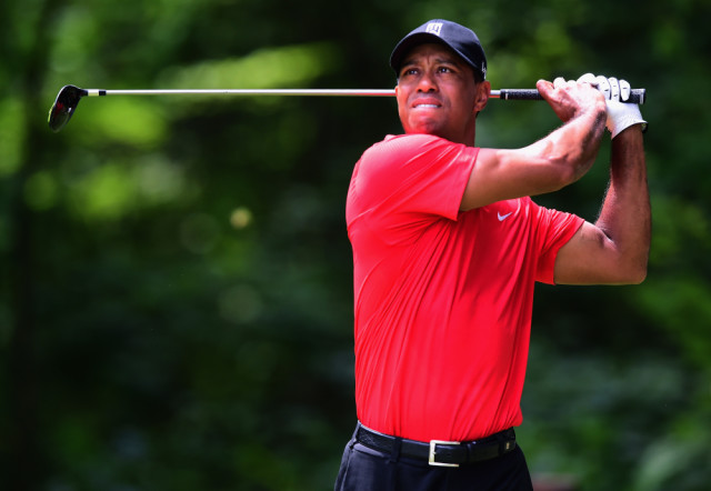 GREENSBORO, NC - AUGUST 23: Tiger Woods tees off on the second hole during the final round of the Wyndham Championship at Sedgefield Country Club on August 23, 2015 in Greensboro, North Carolina. (Photo by Jared C. Tilton/Getty Images)