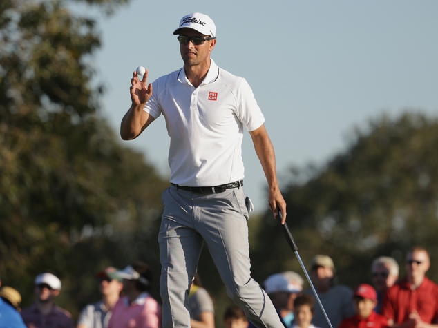 Adam Scott, of Australia, gestures after making a birdie putt on the 14th hole during the final round of the Cadillac Championship golf tournament, Sunday, March 6, 2016, in Doral, Fla. (AP Photo/Lynne Sladky)