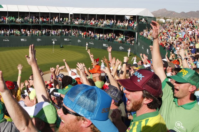 SCOTTSDALE, AZ - FEBRUARY 2: Fans cheer Phil Mickelson's near hole-in-one on the 16th hole during the third round of the Waste Management Phoenix Open at TPC Scottsdale on February 2, 2013 in Scottsdale, Arizona. (Photo by Hunter Martin/Getty Images)