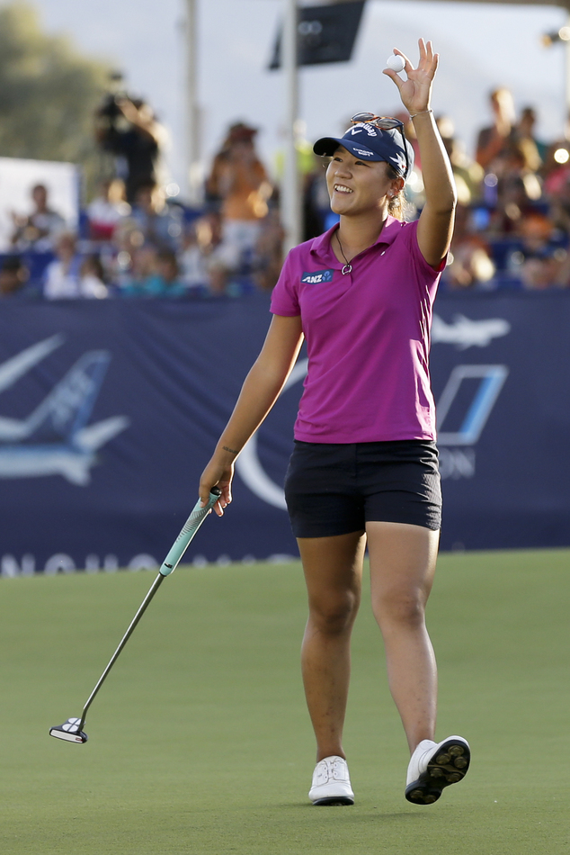 Lydia Ko, of New Zealand, reacts as she finishes up on the 18th hole, on her way to winning the LPGA Tour ANA Inspiration golf tournament at Mission Hills Country Club, Sunday, April 3, 2016, in Rancho Mirage, Calif. (AP Photo/Gregory Bull)