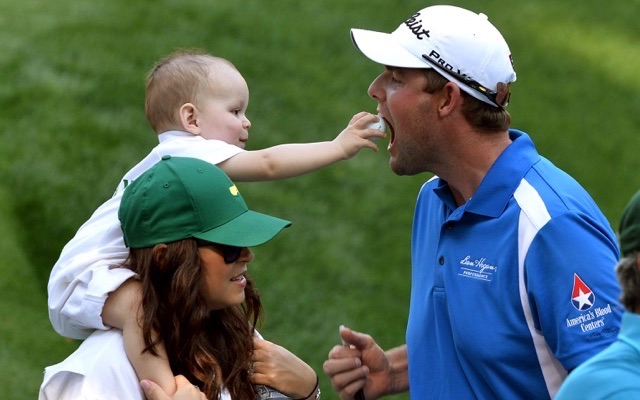 Marc Leishman of Australia with his wife Audrey and son Harvey during the Par 3 Contest held the day before the start of the 77th Masters golf tournament at Augusta National Golf Club on April 10, 2013 in Augusta, Georgia. AFP PHOTO / JEWEL SAMAD (Photo credit should read JEWEL SAMAD/AFP/Getty Images)
