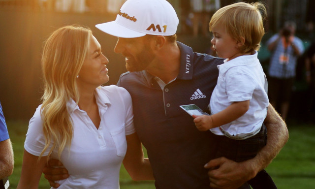 OAKMONT, PA - JUNE 19: Dustin Johnson of the United States celebrates with partner Paulina Gretzky and son Tatum after winning the U.S. Open at Oakmont Country Club on June 19, 2016 in Oakmont, Pennsylvania. (Photo by David Cannon/Getty Images)