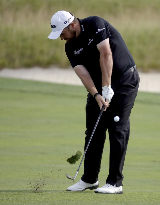 Shane Lowry, of Republic of Ireland, hits from the fairway on the third hole during third round of the U.S. Open golf championship at Oakmont Country Club on Saturday, June 18, 2016, in Oakmont, Pa. (AP Photo/John Minchillo)