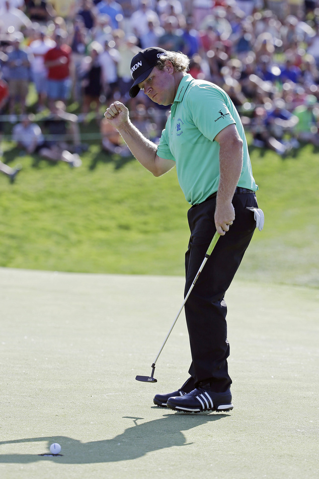 William McGirt celebrates winning the Memorial golf tournament in a playoff, Sunday, June 5, 2016, in Dublin, Ohio. (AP Photo/Darron Cummings)