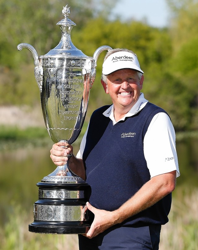 BENTON HARBOR, MI - MAY 25: Colin Montgomerie of Scotland poses with the Alfred S. Bourne Trophy after winning the 2014 Senior PGA Championship presented by KitchenAid with a winning score of -13 at the Golf Club at Harbor Shores on May 25, 2014 in Benton Harbor, Michigan. (Photo by Gregory Shamus/Getty Images)